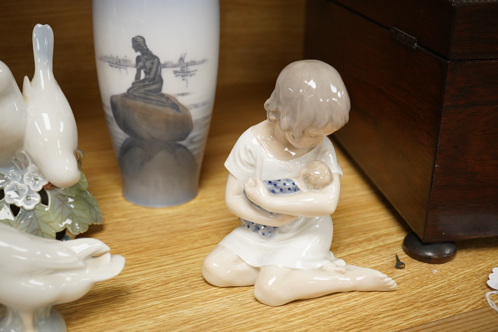 A group of Copenhagen, Nao and Lladro figures to include birds, together with a Royal Copenhagen vase, largest 21cm high